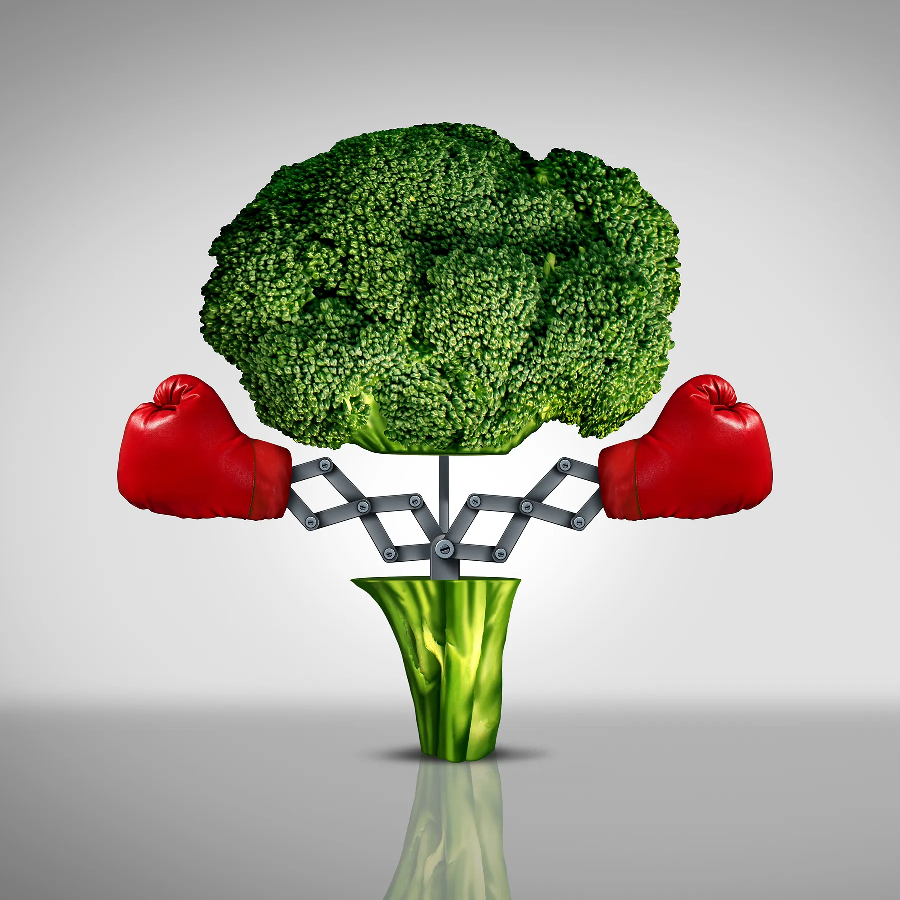 Broccoli head with red boxing gloves attached by mechanical arms, symbolizing powerful health benefits and wellness.