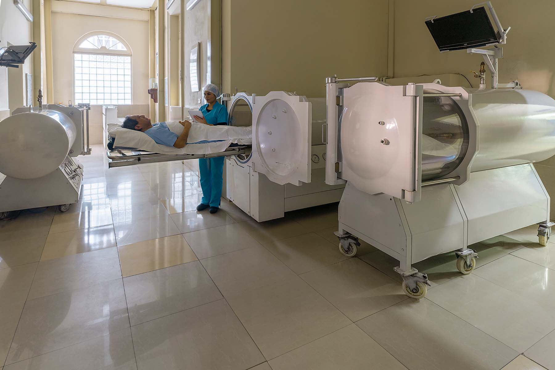 Hyperbaric chambers help patients recover. Stock image of three HCs