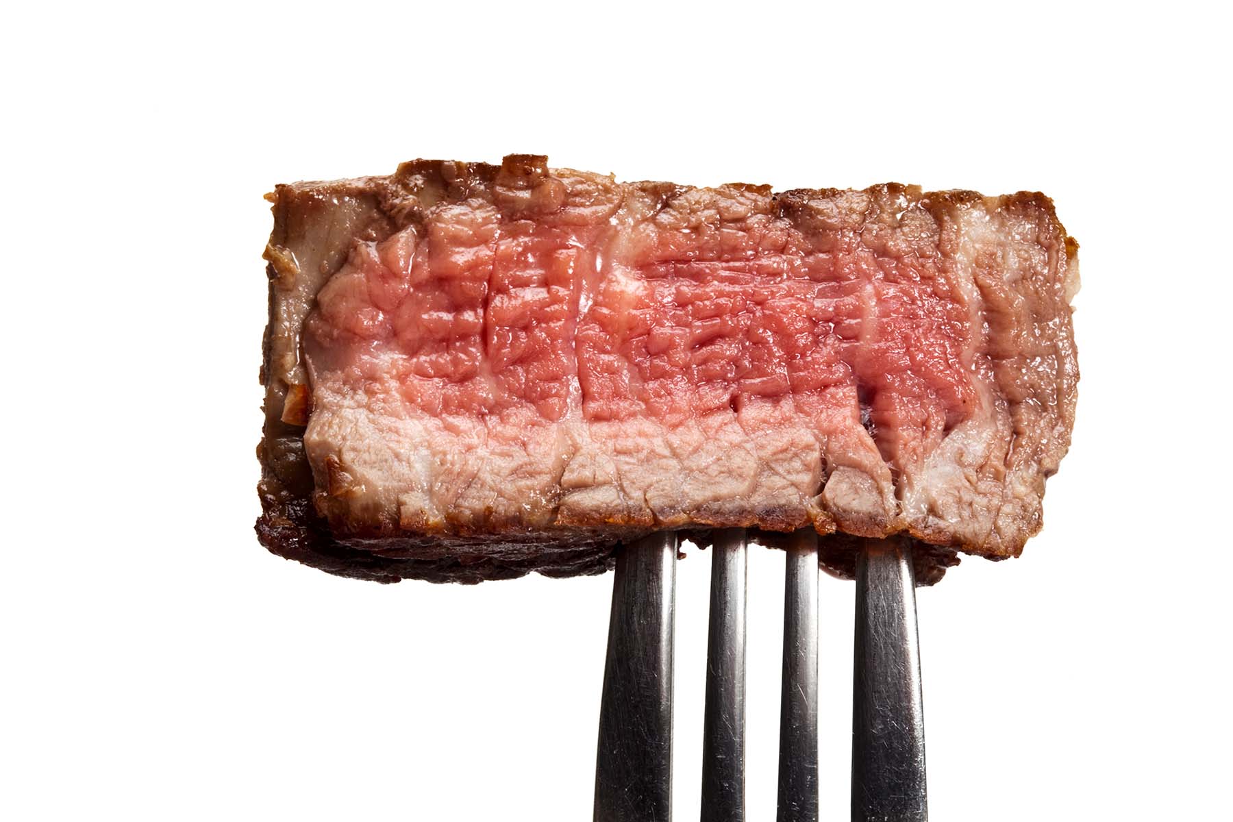 Red meat on a fork