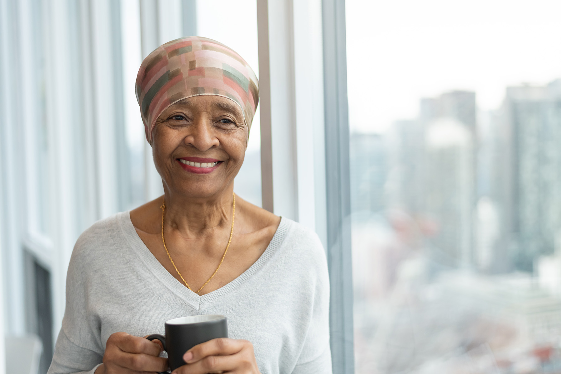 A black senior woman with cancer