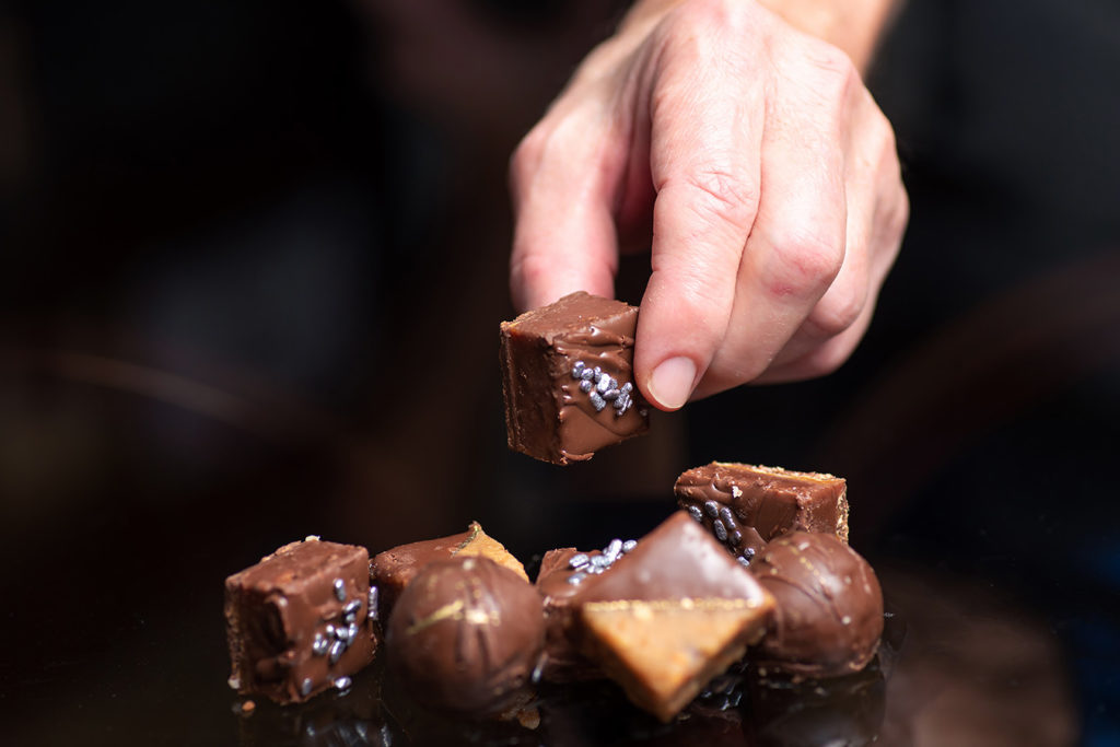 Added sugars can be in a lot more places than yummy chocolate and caramels like the ones in this image.