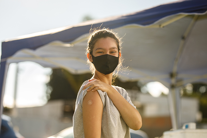 Teen girl after her vaccination