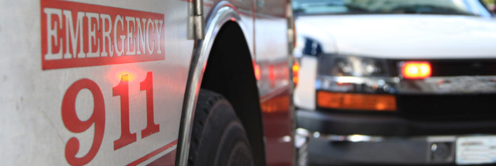 Close up photo of two emergency vehicles