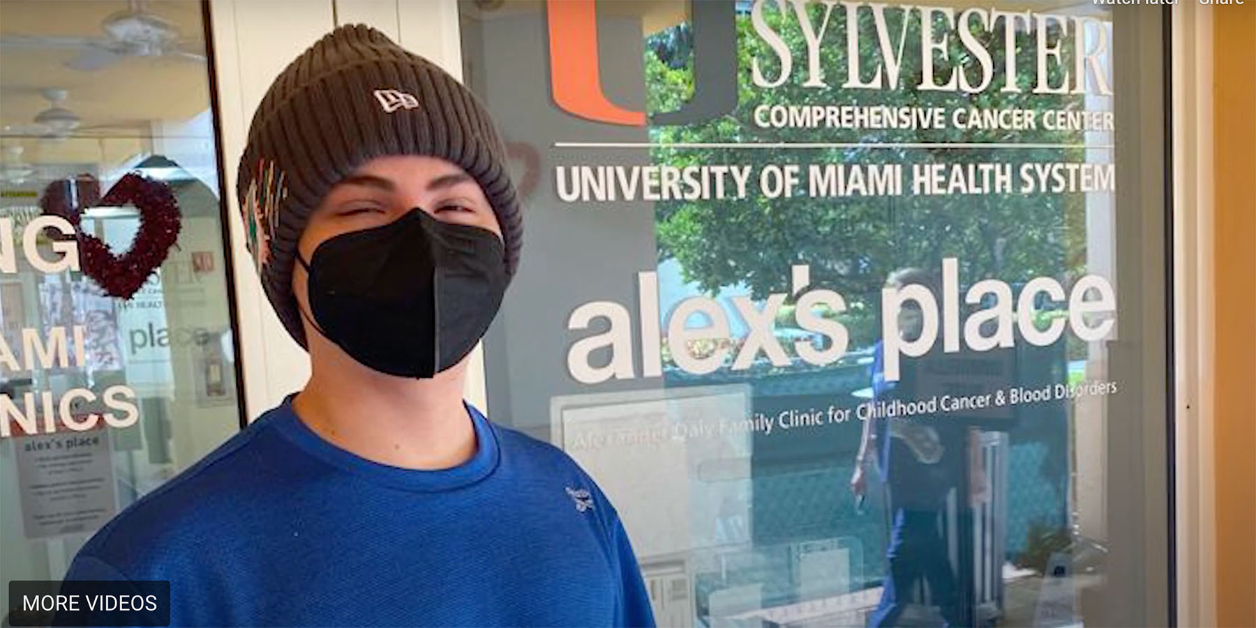 Teen cancer patient stands outside alex's place at Sylvester Comprehensive Cancer Center in Miami.