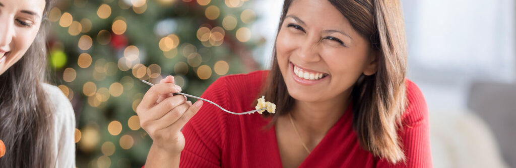 woman eating during the holidays