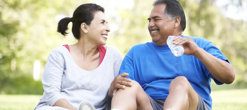 couple drinking water for heart health in summer