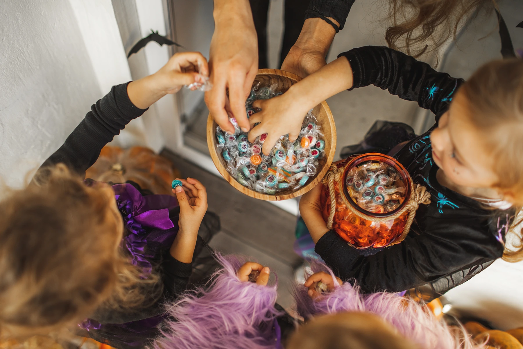 Kids get candy while trick or treating