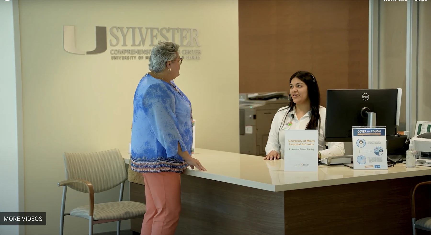 Myeloma patient enters the lobby of Sylvester Comprehensive Cancer Center to check in for her appointment.