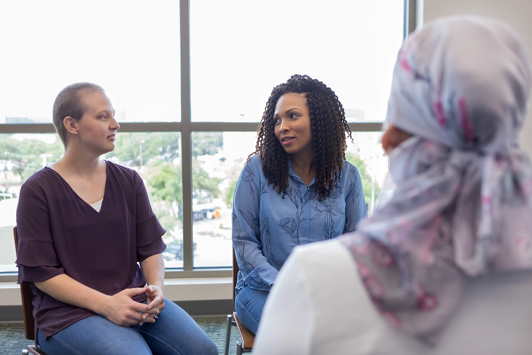 Ethnically diverse group of young female cancer survivors.