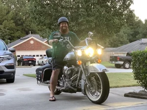 Brian Loy, brain cancer survivor, on his motorcycle.