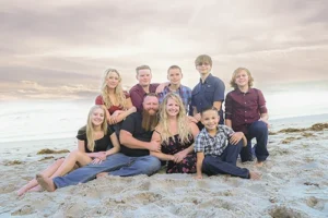Loy family photoshoot on the beach on a beautiful day.