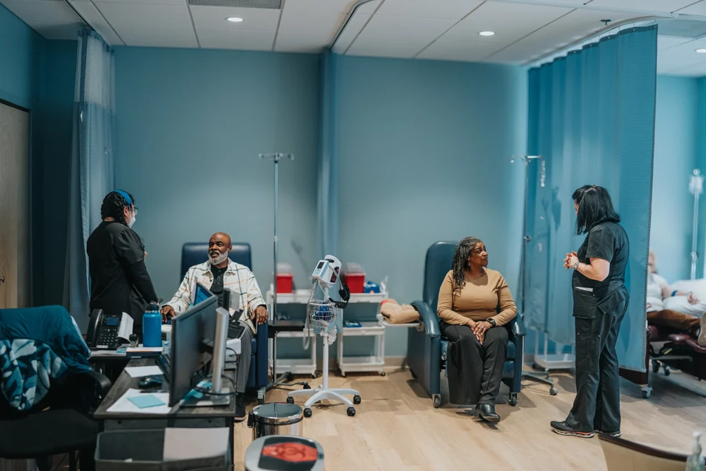 Getty image of people at cancer clinical trial getting treatment.
