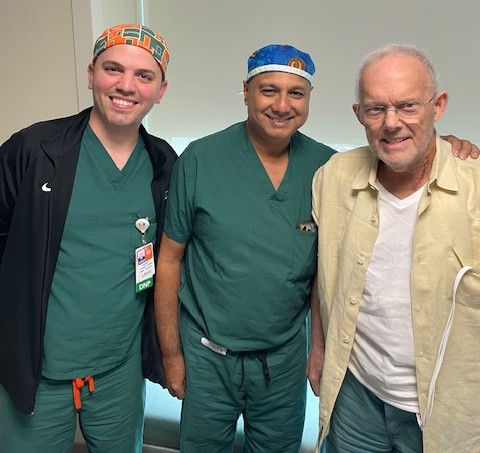 Dr. Nipun Merchant with Freddie and and Michael Hellem
