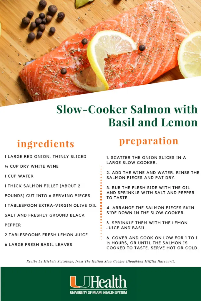 Raw salmon fillet garnished with lemon and seasoning on a cutting board, presented with a recipe for Slow-Cooker Salmon with Basil and Lemon.