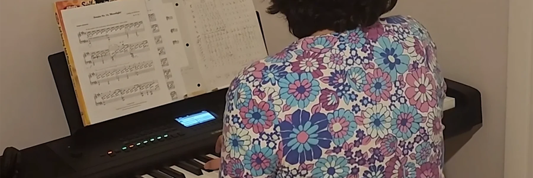 breast cancer survivor plays piano