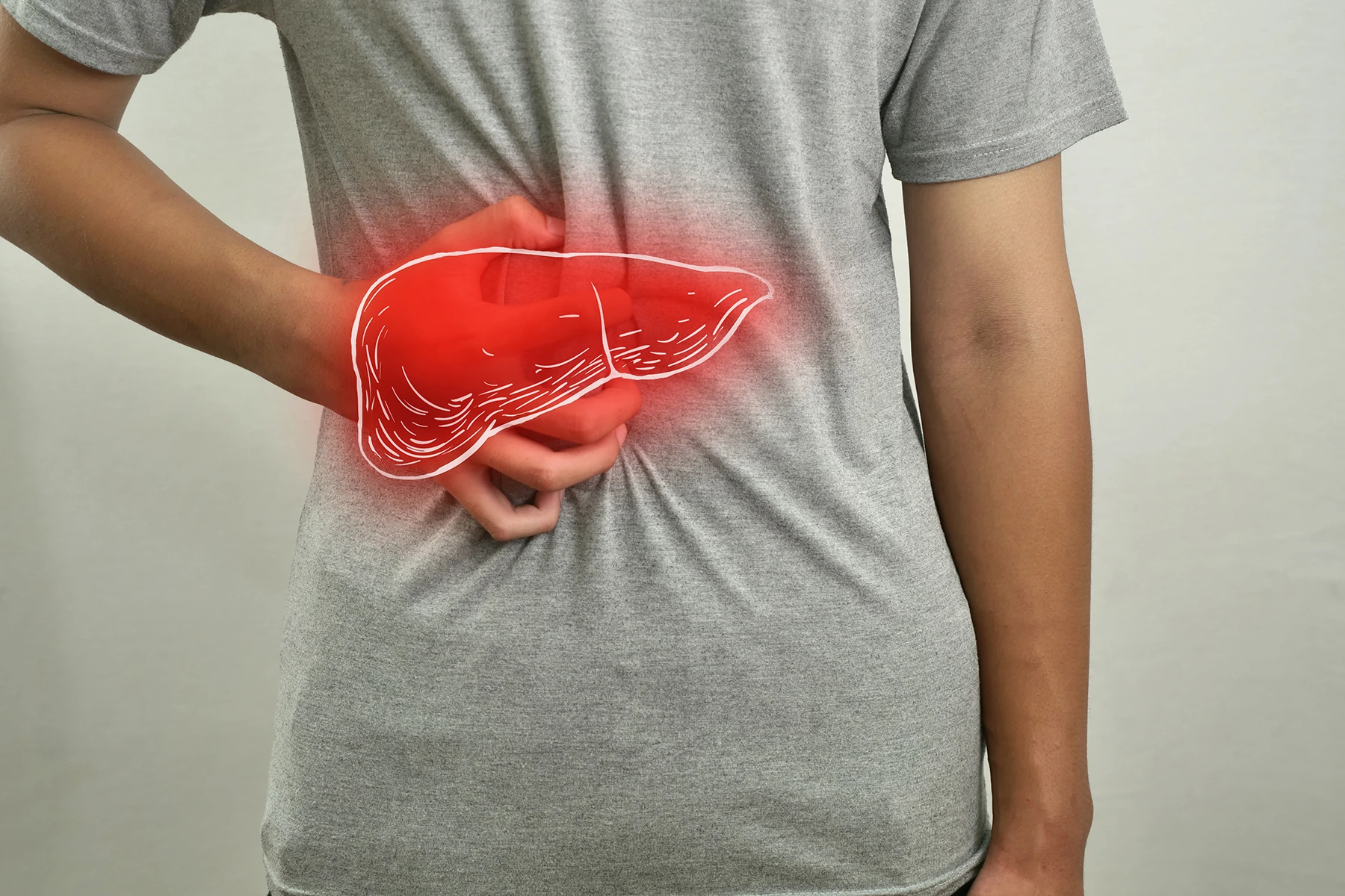 Digital composition of human liver with highlighted red inflammation on sick person, man with stomach pain - stock photo