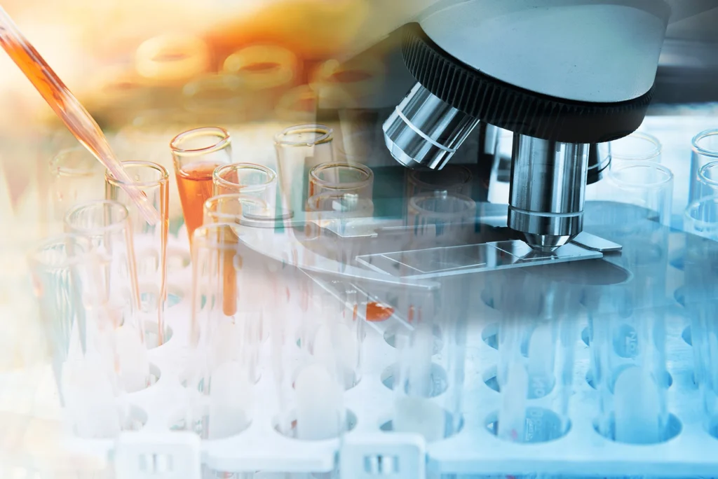 Blood test (liquid biopsy) under microscope.
