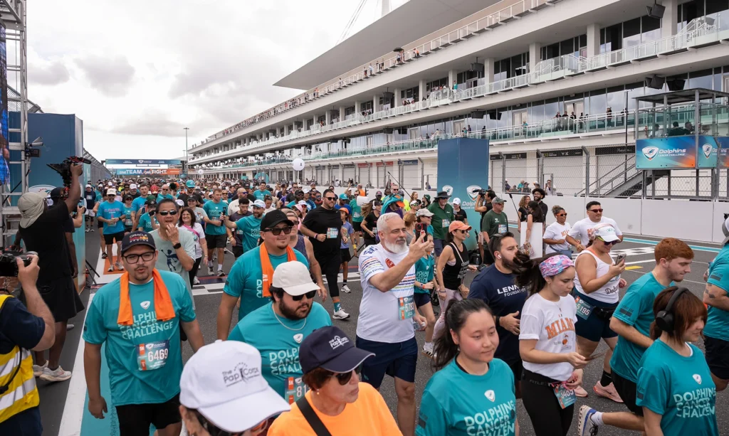 A group photo of the start of the 5K race at the 2026 Dolphins Cancer Challenge at Hard Rock Stadium in Miami.