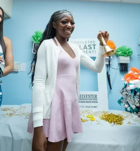 Jada Anderson rings the bell at her last chemo treatment.
