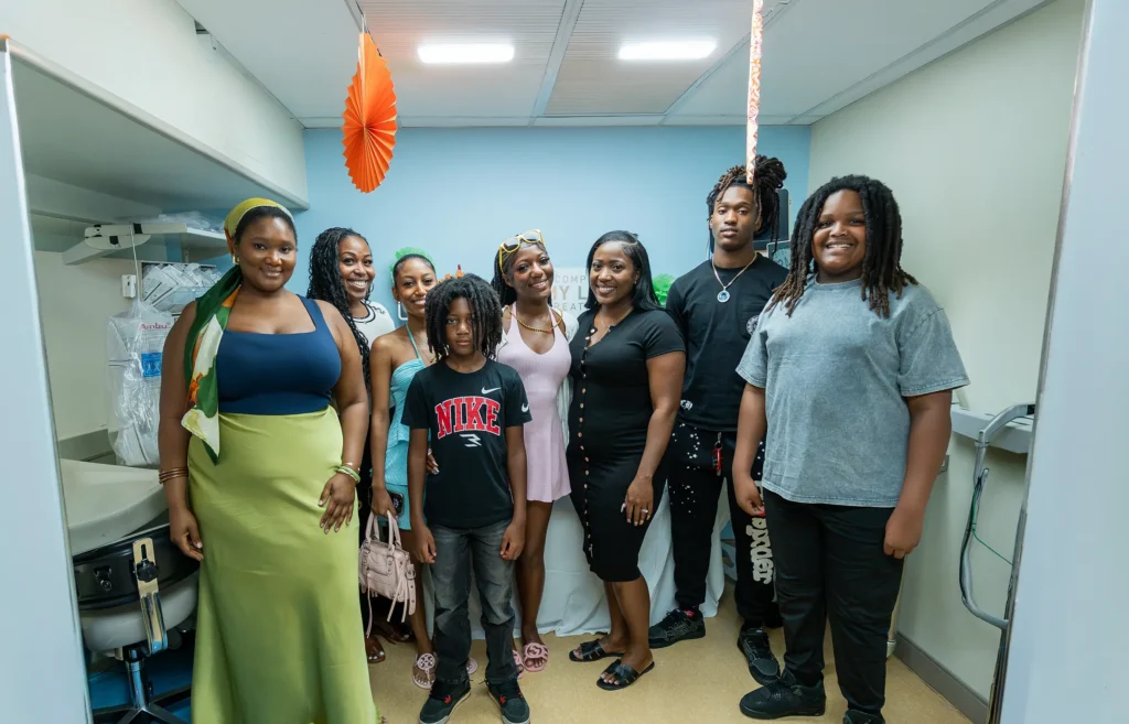 Jada Anderson and her family celebrating her last day of chemo at Sylvester Comprehensive Cancer Center.
